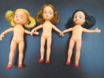3 nude small dolls view